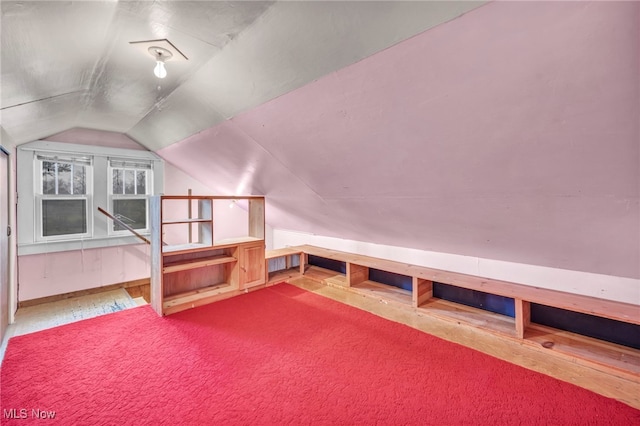 bonus room featuring vaulted ceiling