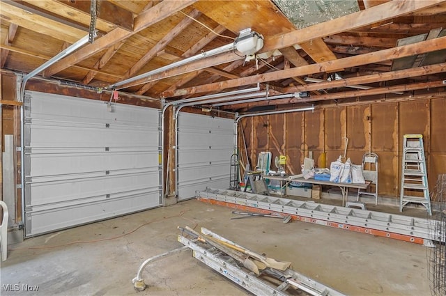 garage featuring a garage door opener