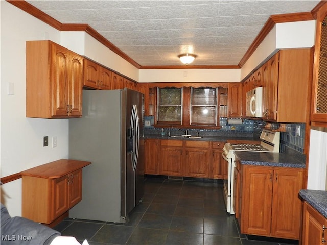 kitchen featuring glass insert cabinets, dark countertops, white appliances, and brown cabinets