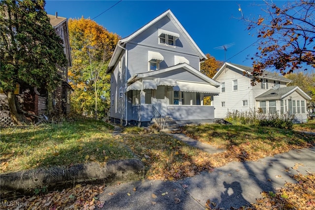 view of property featuring a front yard