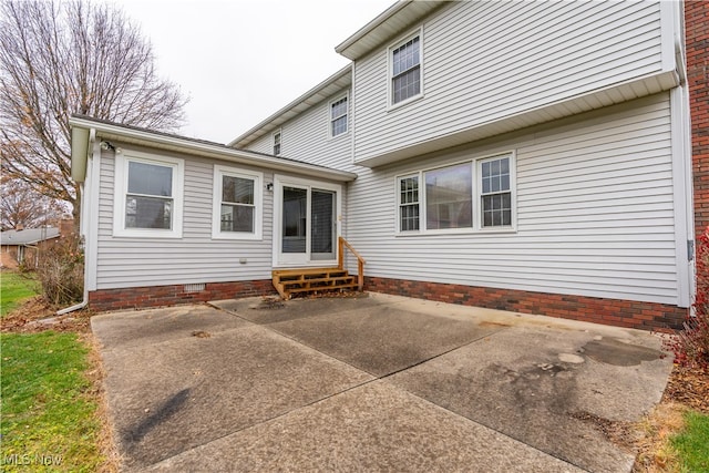 rear view of property with a patio area