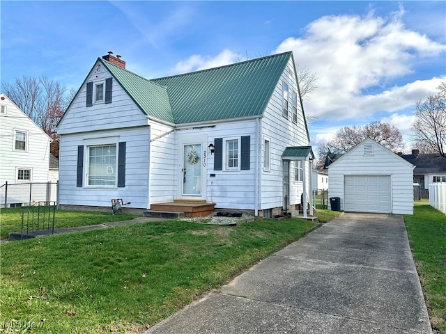 view of front of property with an outbuilding, a garage, and a front yard