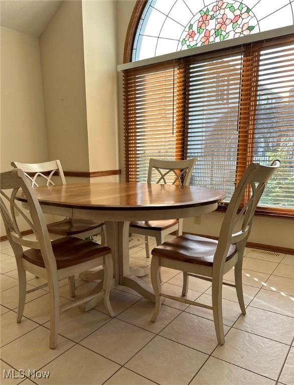 view of tiled dining area