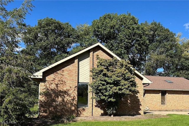 view of property exterior featuring a patio