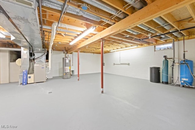 basement with gas water heater and heating unit