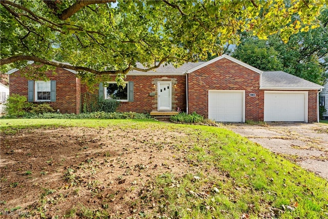 ranch-style home featuring a garage