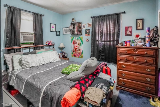 bedroom featuring cooling unit