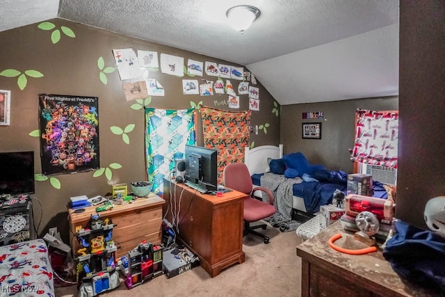 carpeted office space featuring a textured ceiling and vaulted ceiling