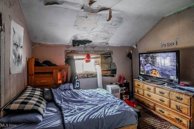 bedroom with vaulted ceiling