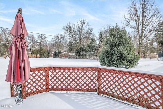 view of snow covered deck