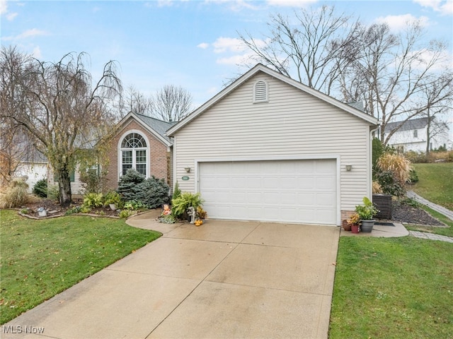 ranch-style house with a front yard and a garage