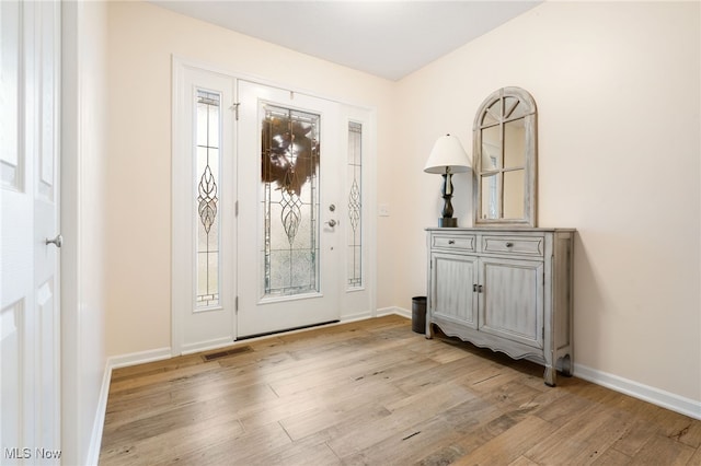 foyer entrance featuring light wood-type flooring