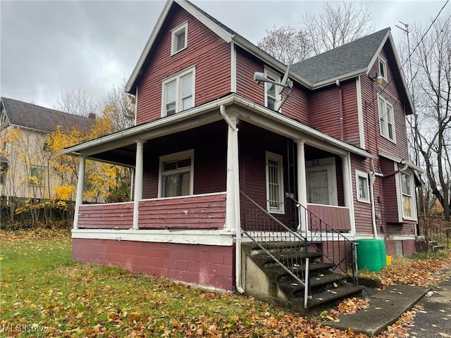 view of home's exterior with covered porch