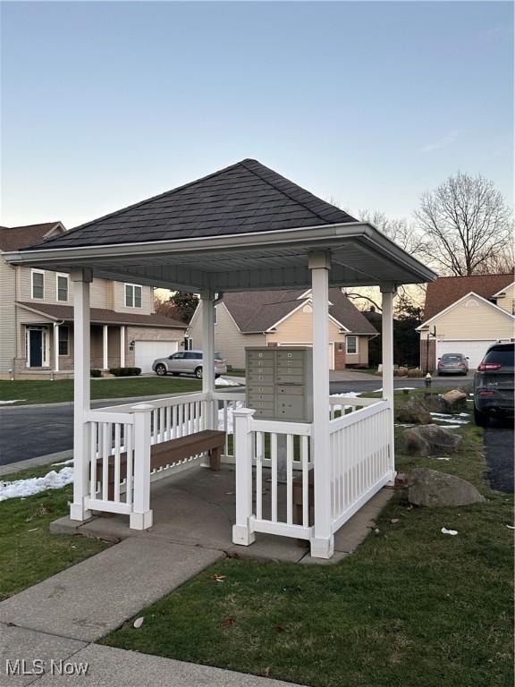 view of patio with a mail area