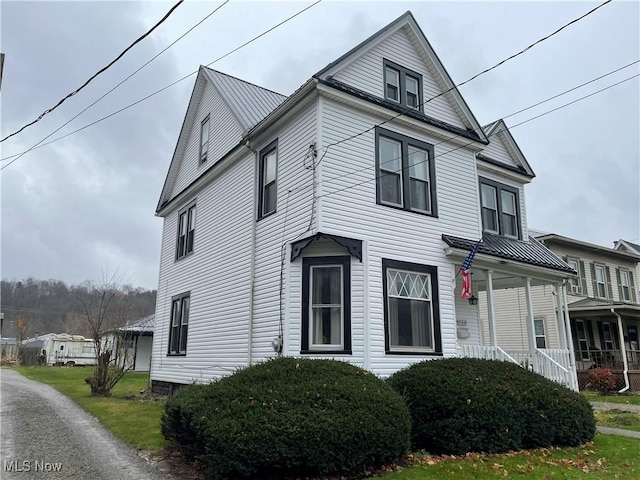 520 E Lincoln Way, Lisbon, OH 44432 - view of property exterior featuring a porch