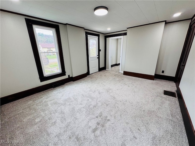 spare room with light colored carpet