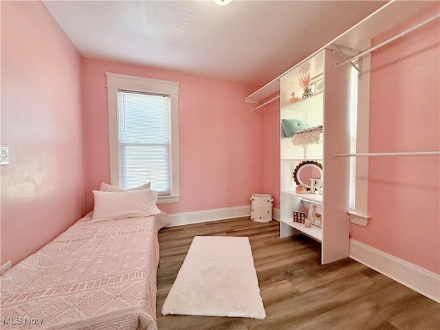 bedroom featuring wood-type flooring