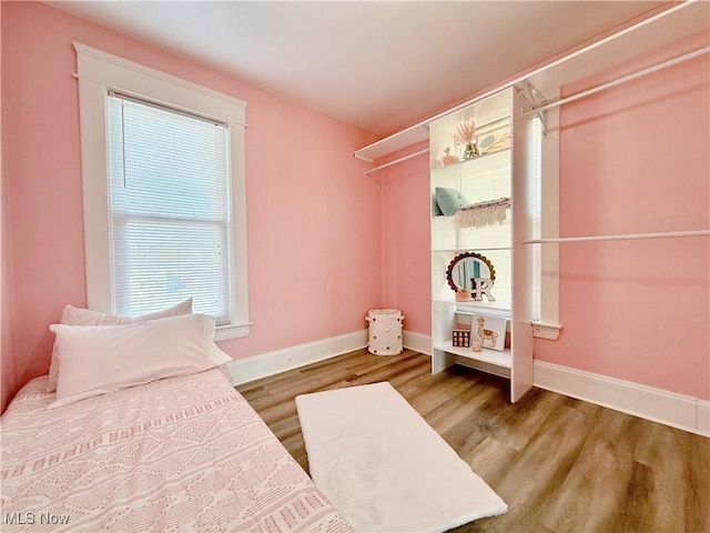 bedroom featuring hardwood / wood-style flooring