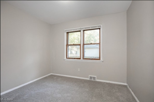 view of carpeted spare room