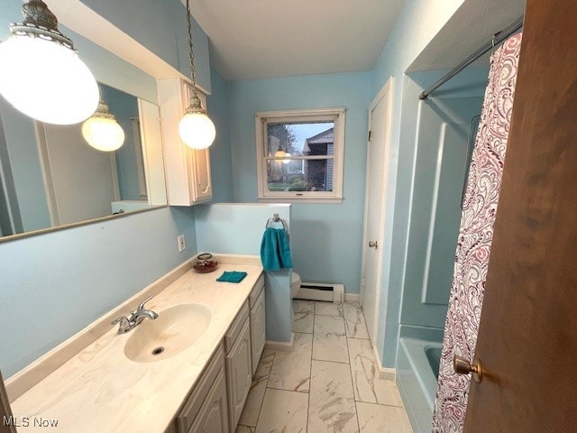 bathroom with vanity, a baseboard radiator, and shower / bath combo with shower curtain