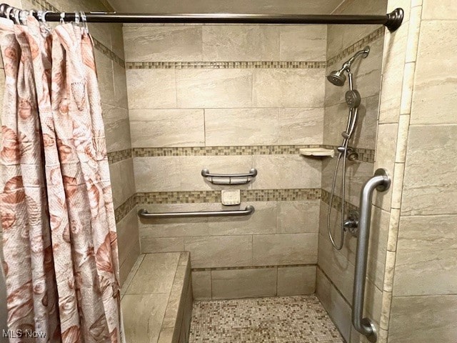 bathroom featuring walk in shower