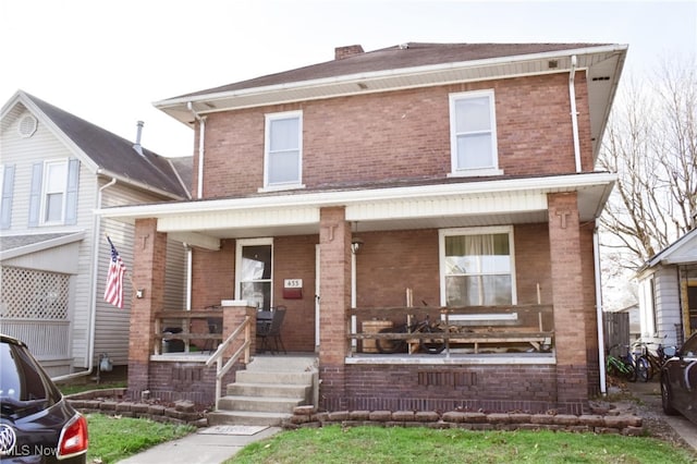 view of front facade with covered porch