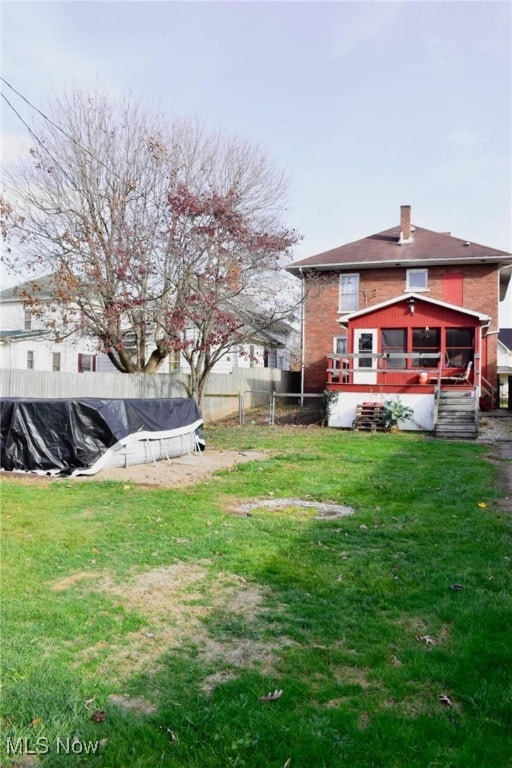 view of yard featuring a pool side deck