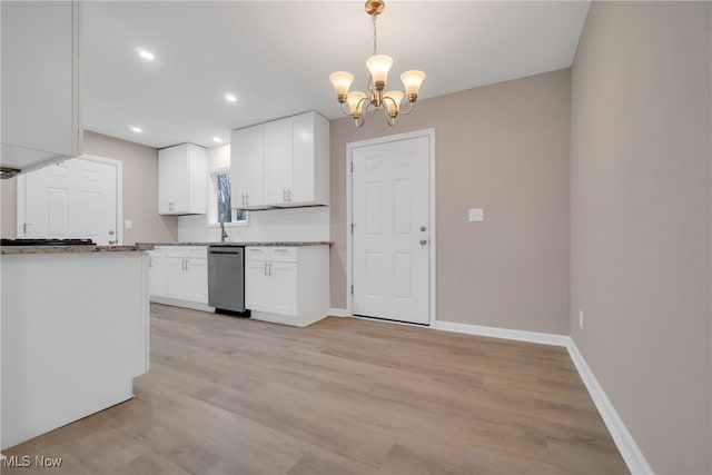 kitchen with stainless steel dishwasher, decorative light fixtures, light hardwood / wood-style flooring, a notable chandelier, and white cabinetry