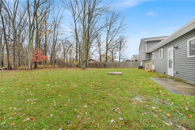 view of yard with central AC