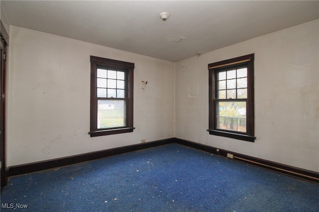 empty room featuring plenty of natural light