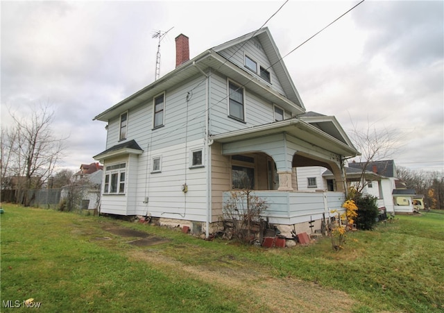 view of property exterior with a yard