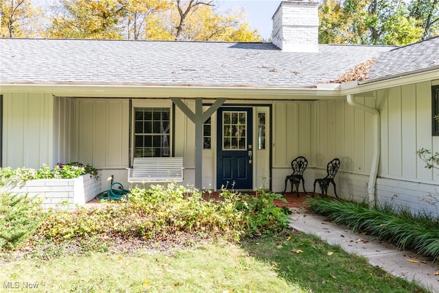 property entrance with covered porch