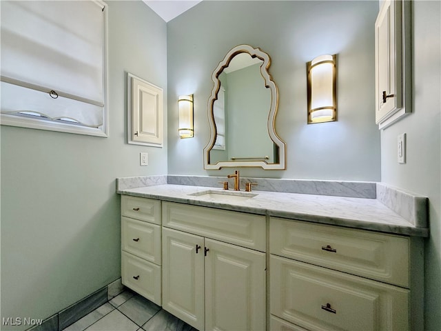 bathroom featuring tile patterned floors and vanity