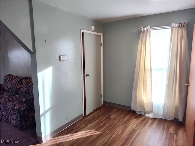 975 Broad St, Conneaut, OH 44030 - spare room featuring wood finished floors