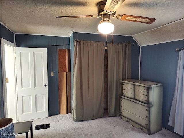 975 Broad St, Conneaut, OH 44030 - bedroom featuring carpet flooring, ceiling fan, lofted ceiling, and a textured ceiling