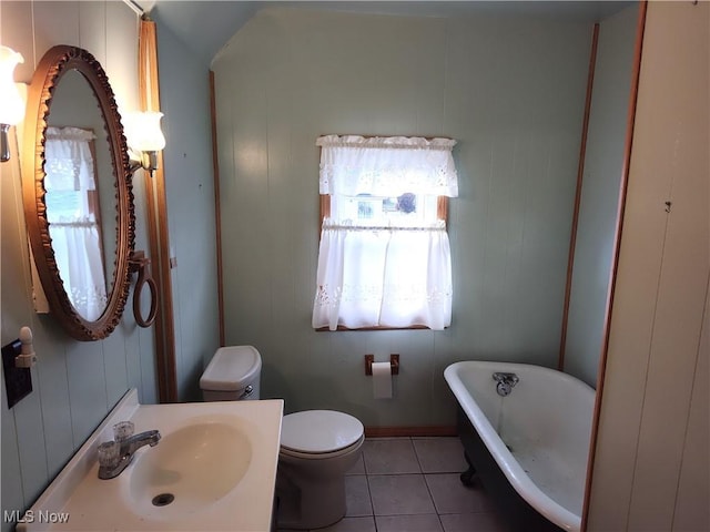 975 Broad St, Conneaut, OH 44030 - bathroom with a freestanding bath and tile patterned flooring