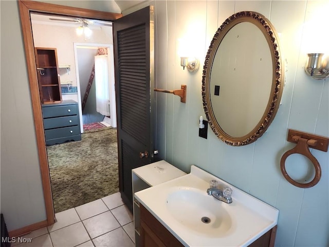 975 Broad St, Conneaut, OH 44030 - bathroom with vanity, ceiling fan, and tile patterned floors
