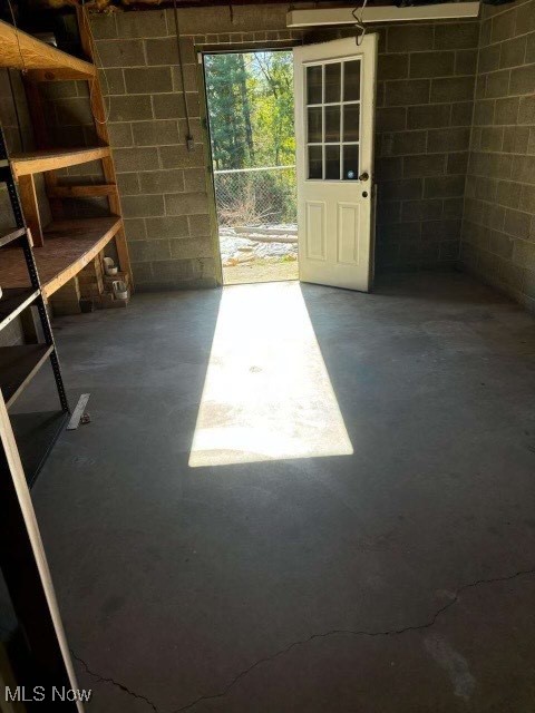 interior space featuring concrete flooring