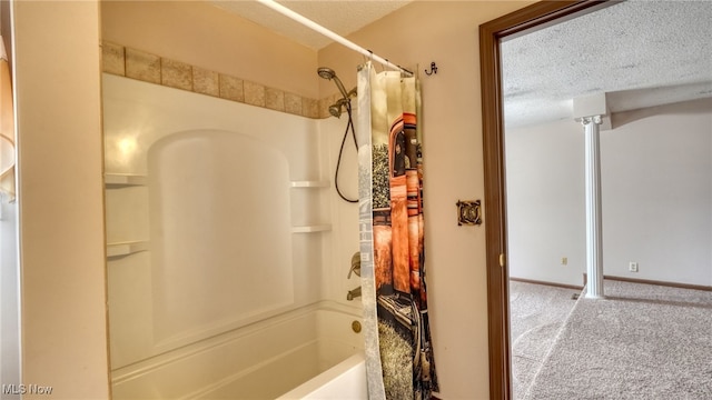 bathroom featuring shower / bathtub combination with curtain and a textured ceiling