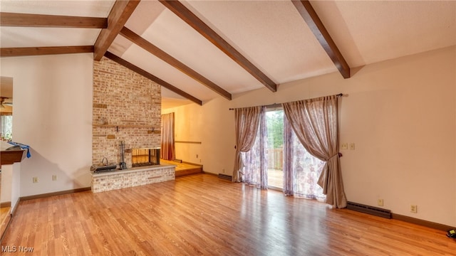 unfurnished living room featuring vaulted ceiling with beams, a fireplace, and light wood-type flooring