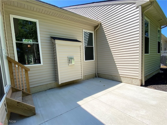 view of home's exterior featuring a patio area