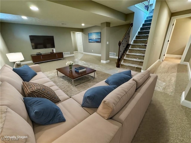 living room featuring light colored carpet