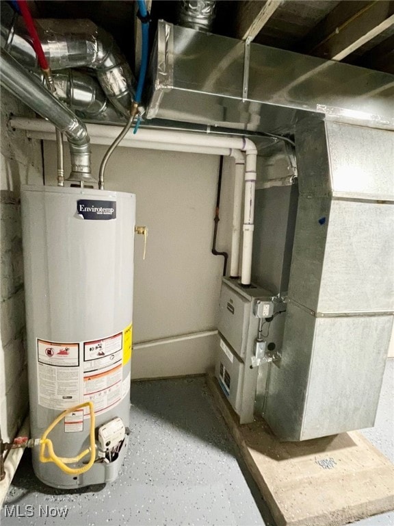 utility room with water heater