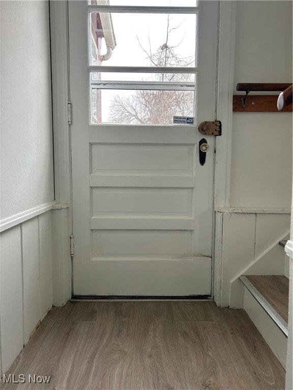 doorway to outside with hardwood / wood-style floors