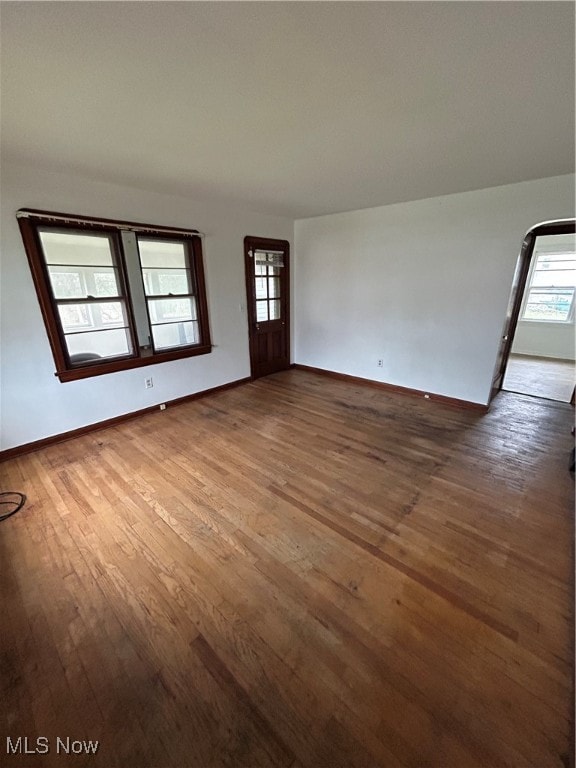 interior space with dark wood-type flooring