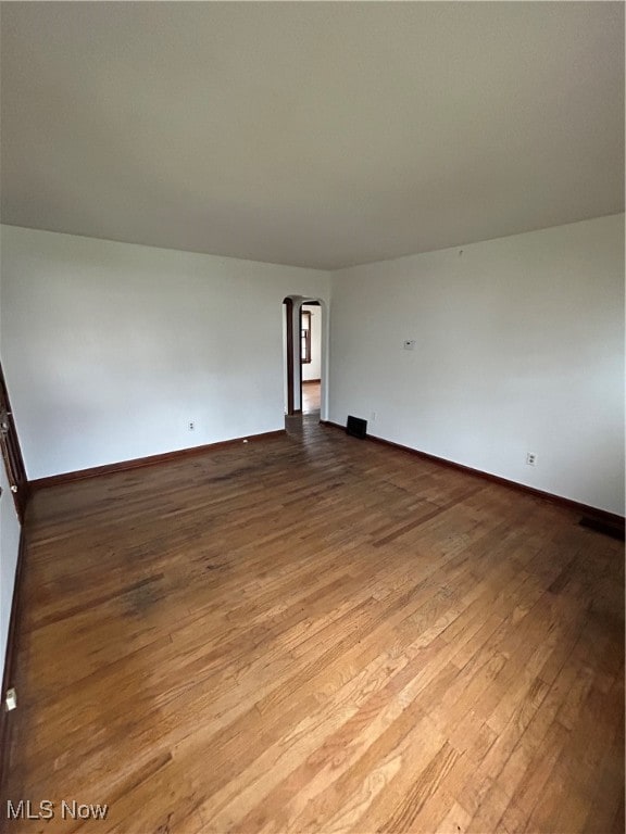 unfurnished room featuring light wood-type flooring