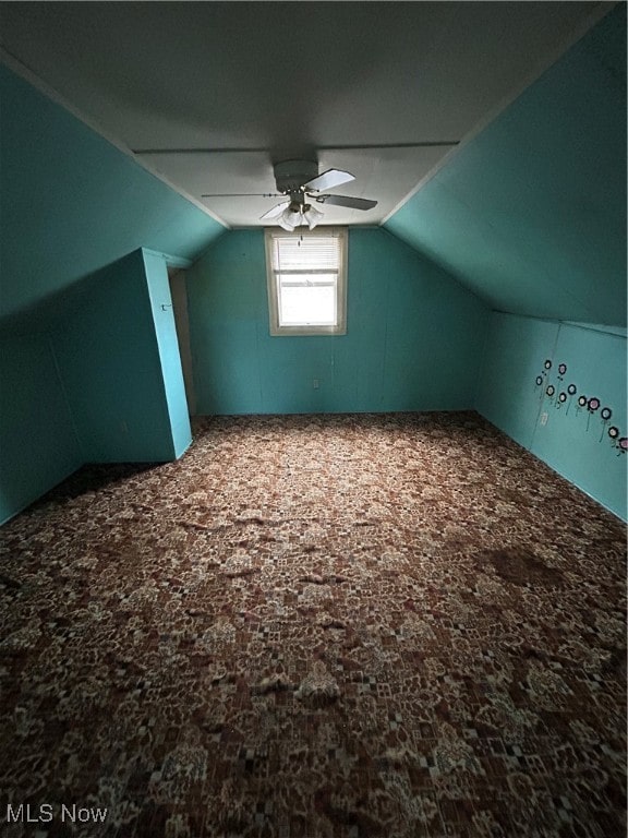 bonus room featuring carpet flooring, ceiling fan, and lofted ceiling