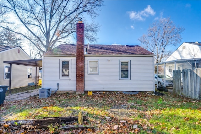 back of property with central air condition unit