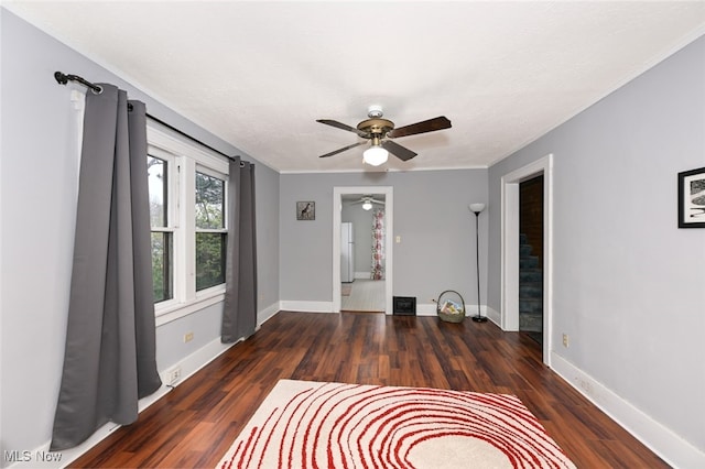 interior space featuring dark hardwood / wood-style flooring and ceiling fan