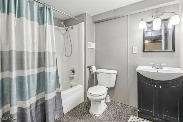 full bathroom featuring tile patterned floors, vanity, shower / tub combo, and toilet